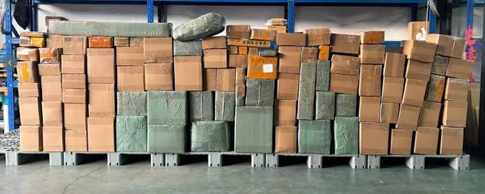 Cartons and parcels consolidated on pallets in the warehouse